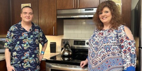 Guests Jennifer and Christopher in the main kitchen of The Doorways