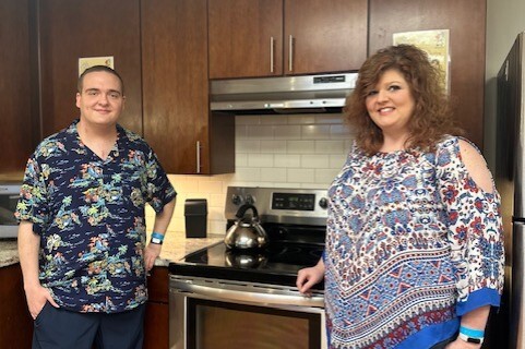 Guests Jennifer and Christopher in the main kitchen of The Doorways